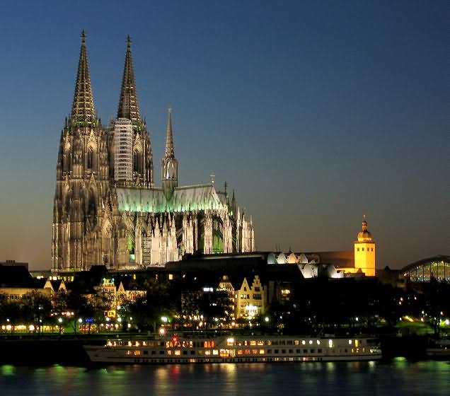 The Cologne Cathedral Lit Up At Night