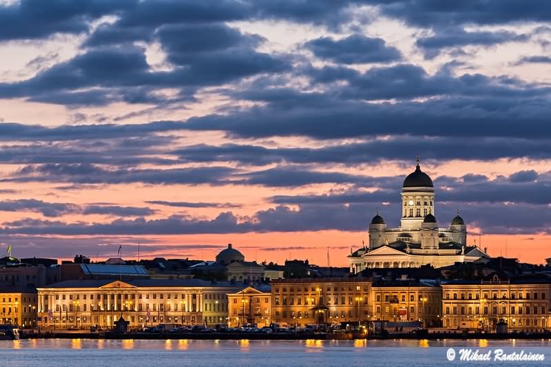 The Helsinki Cathedral At Dusk Across The Lake