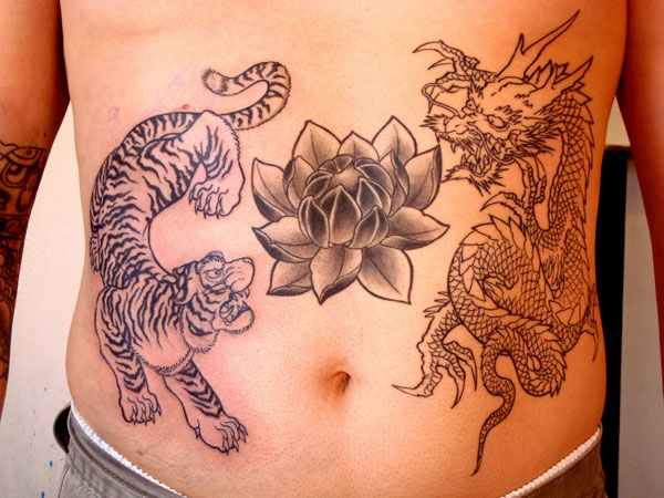 Tiger With Lotus And Dragon Tattoo On Man Stomach