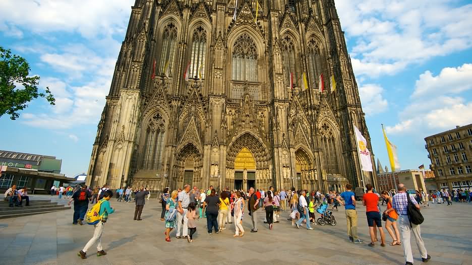 Tourists In Front Of The Cologne Cathedral