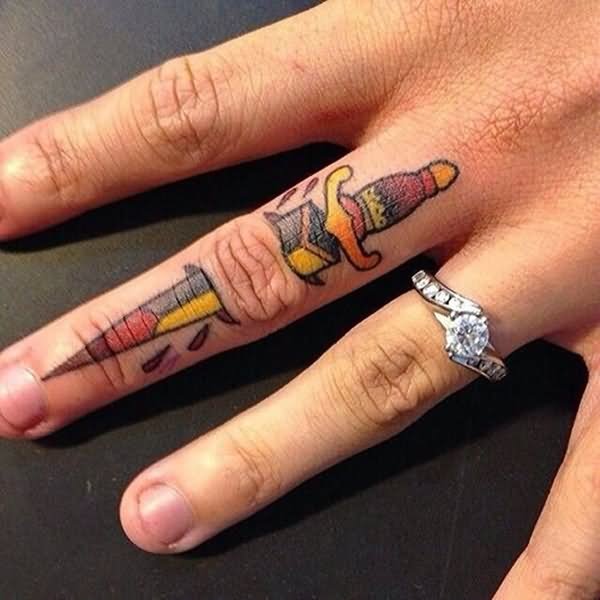Traditional Ripped Skin Dagger Tattoo On Finger