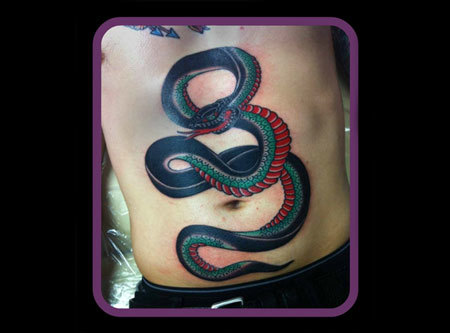 Traditional Snake Tattoo On Man Stomach