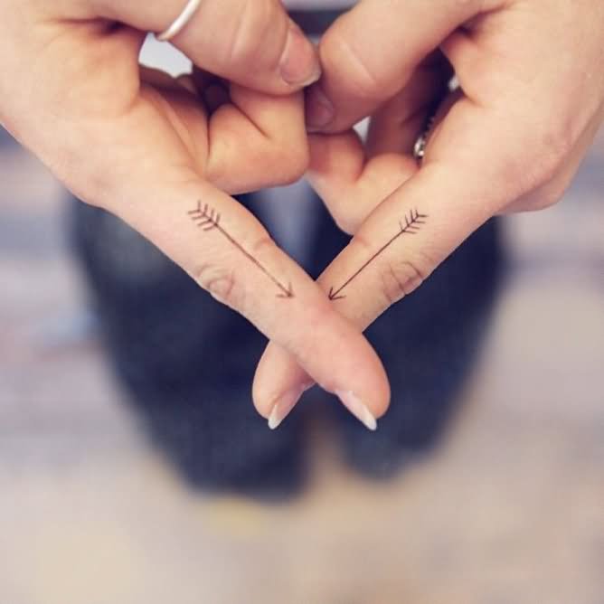 Two Arrow Tattoo On Girl Both Hand Finger