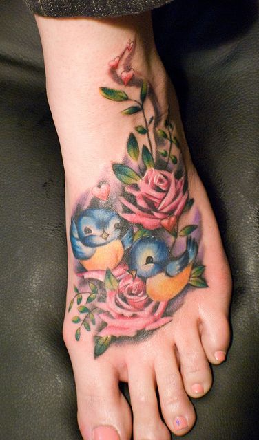 Two Cute Birds With Roses Tattoo On Girl Left Foot