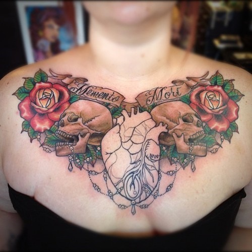 Two Rose Flowers With Skulls And Real Heart Tattoo On Girl Collar Bone