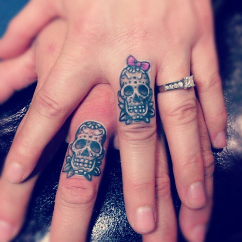 Two Sugar Skull Tattoo On Couple Finger