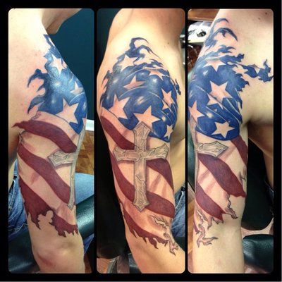 USA Flag With Cross Tattoo On Man Right Half Sleeve