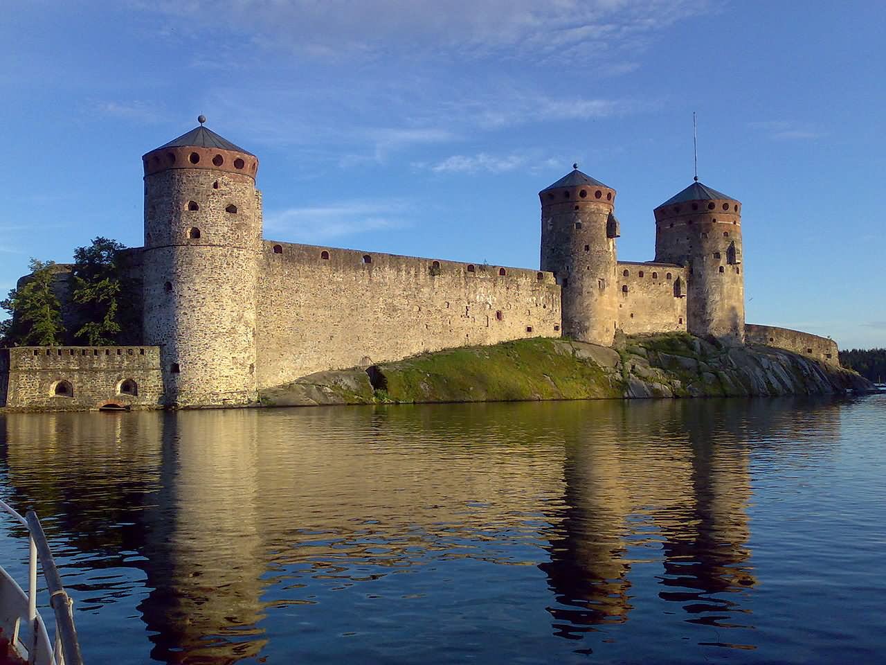 Water Reflection Of The Olavinlinna Castle