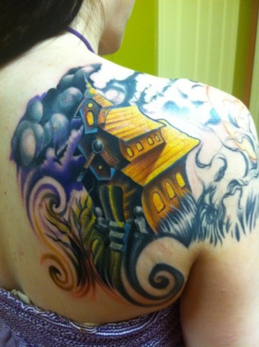 Yellow Haunted House Tattoo On Girl Right Back Shoulder