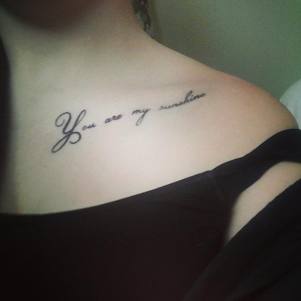 You Are My Sunshine Lettering Tattoo On Girl Collar Bone