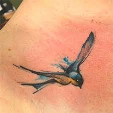 Abstract Flying Bird Tattoo Design