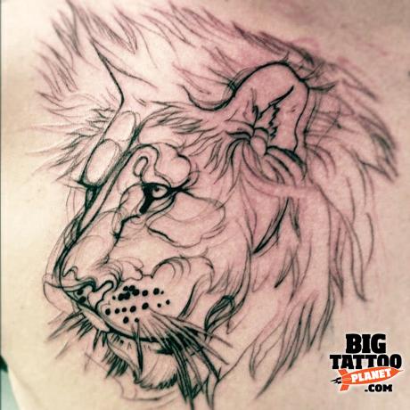 Abstract Lion Head Tattoo On Side Rib