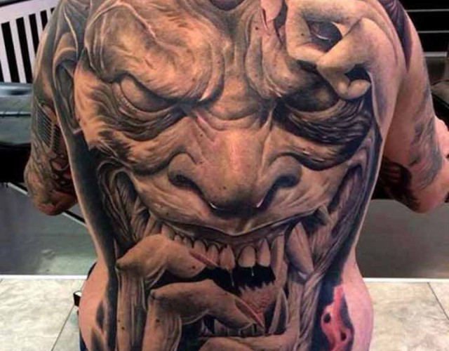 Amazing 3D Horror Face Tattoo On Full Back
