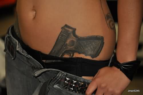 Amazing Hip Revolver Tattoo