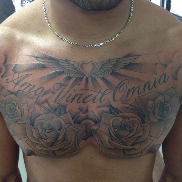 Amor Vincit Omnia - Roses With Clouds Tattoo On Man Chest