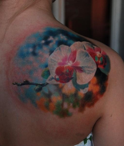 Attractive Abstract Flower Tattoo On Right Back Shoulder