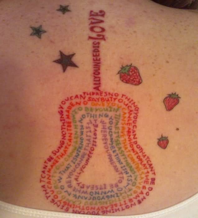 Attractive Beatles Guitar With Stars Tattoo Design