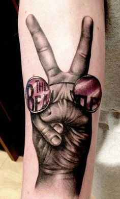 Attractive Beatles Tattoo Design For Half Sleeve By Eze Nunez