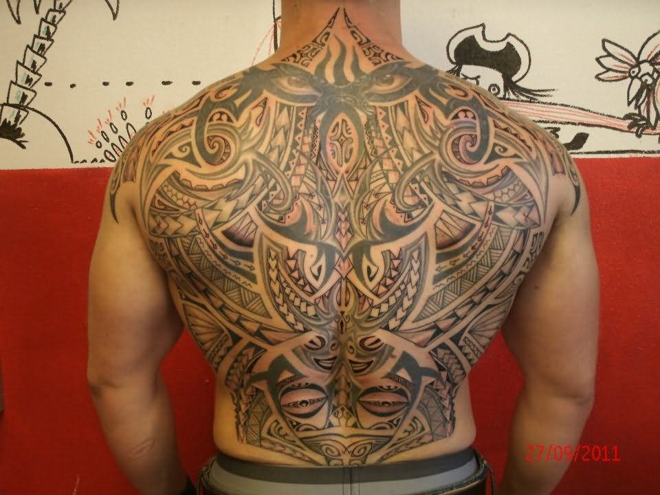 Attractive Black Tribal Design Tattoo On Full Back