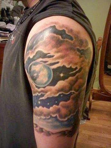 Attractive Clouds With Moon Tattoo On Left Half Sleeve