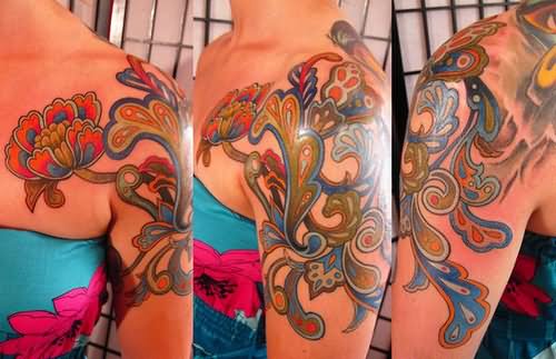 Attractive Colorful Abstract Flowers Tattoo On Left Shoulder By Gene Coffey