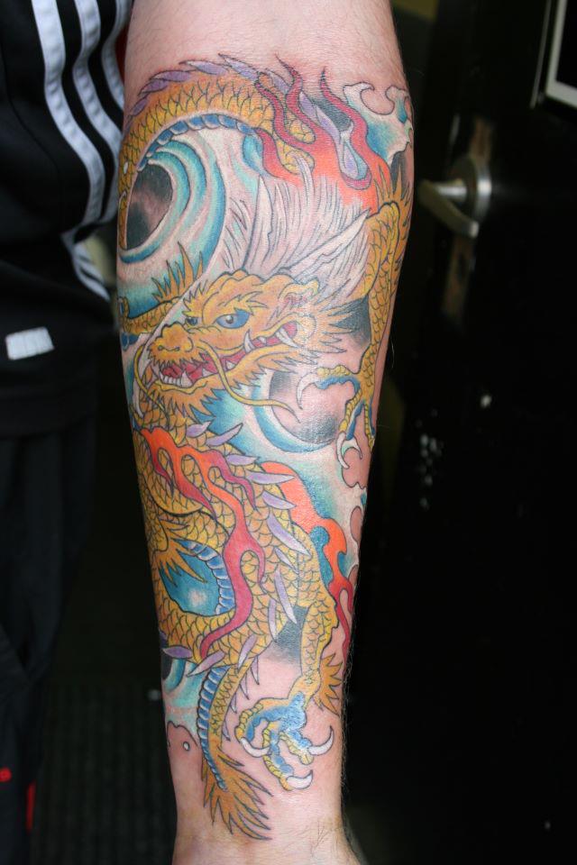 Attractive Colorful Japanese Dragon Tattoo Design For Sleeve