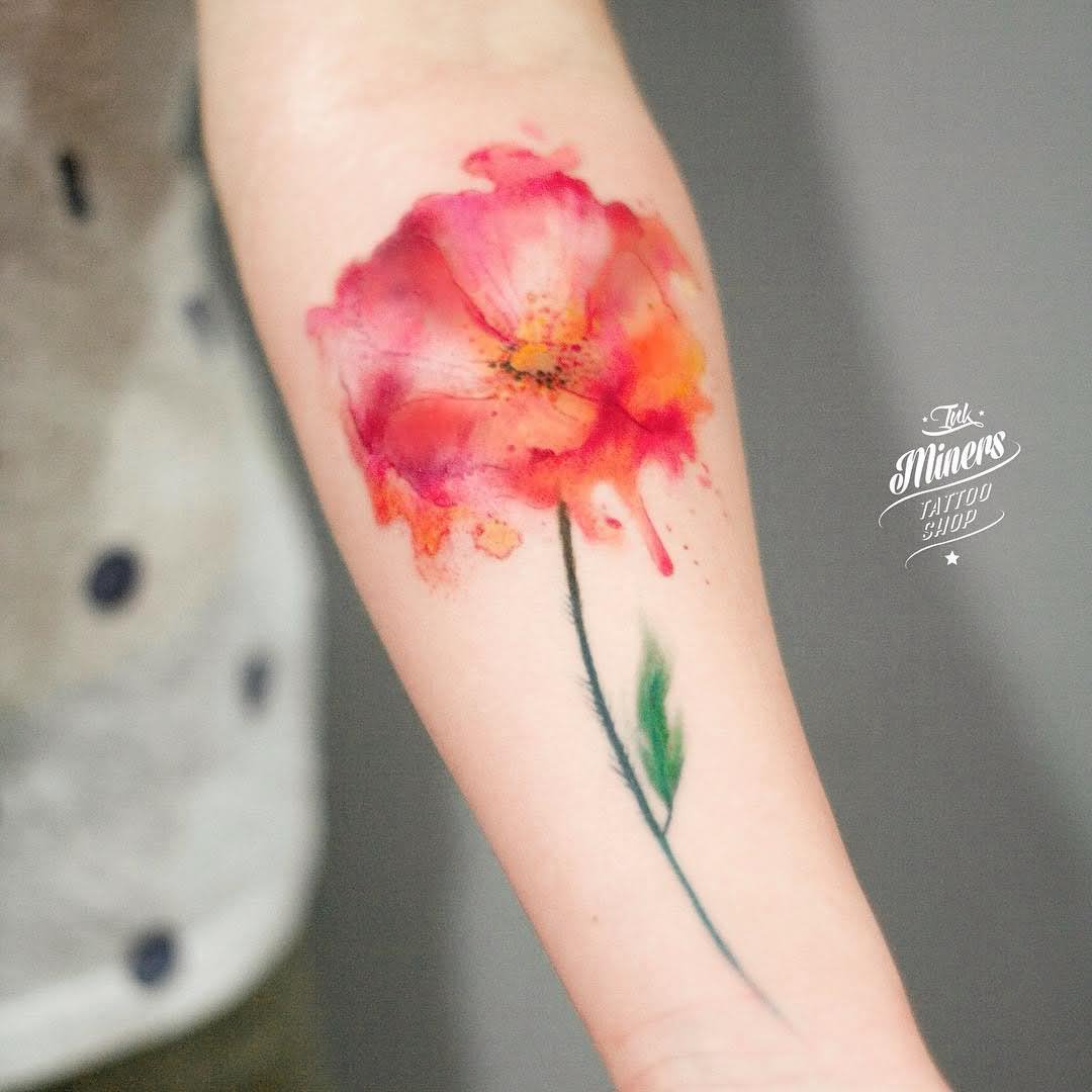 Attractive Watercolor Poppy Flower Tattoo On Forearm