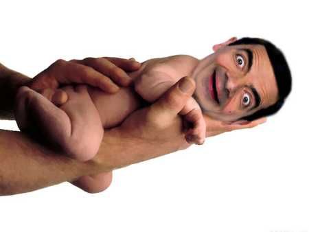 Baby Mr Bean On Hand Funny Image