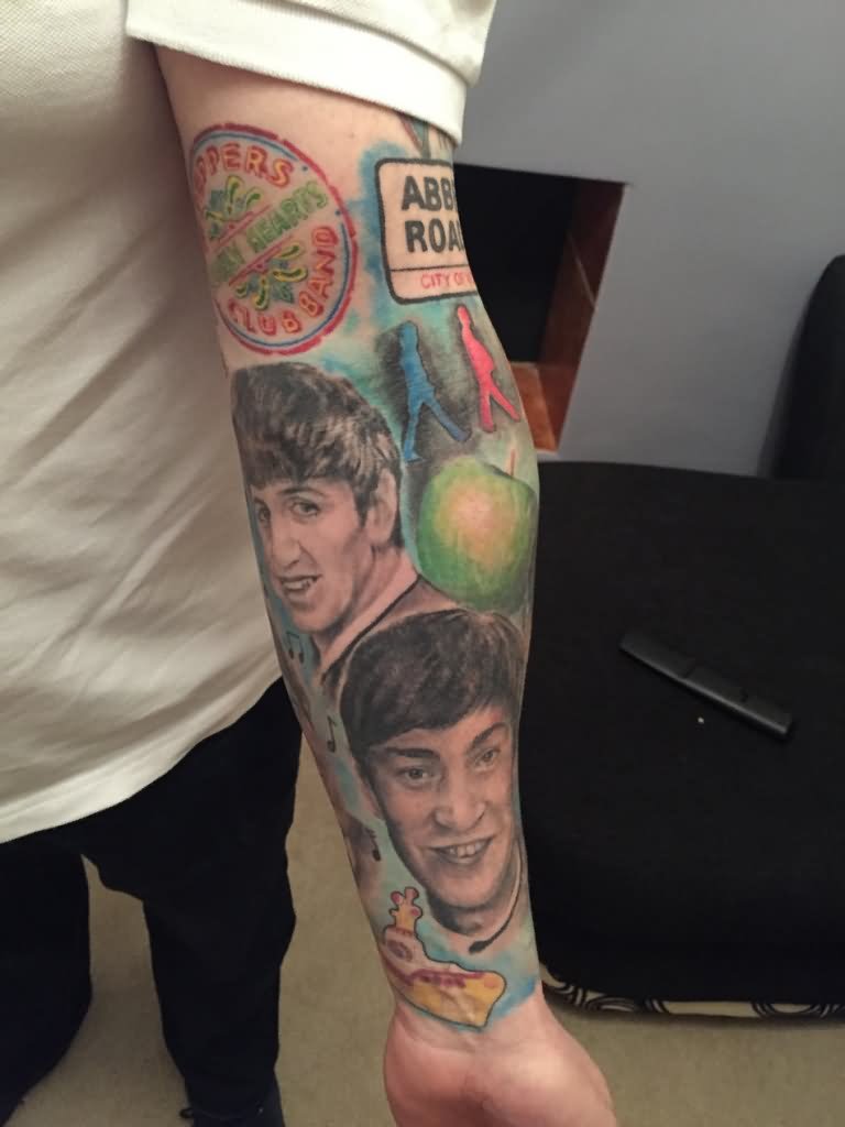 Beatles With Apple Tattoo On Left Forearm