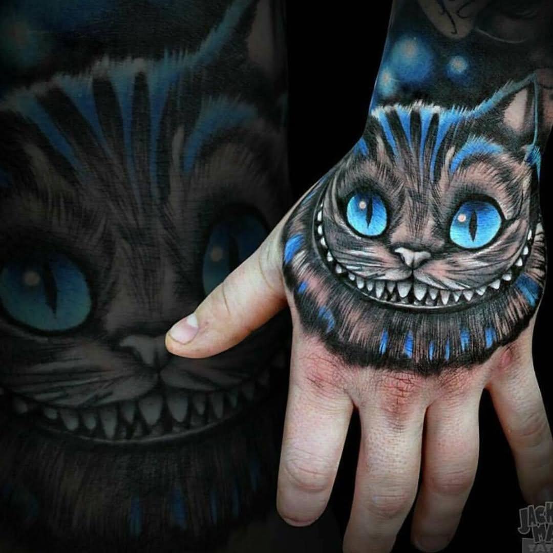 Beautiful Cheshire Cat Tattoo On Left Hand