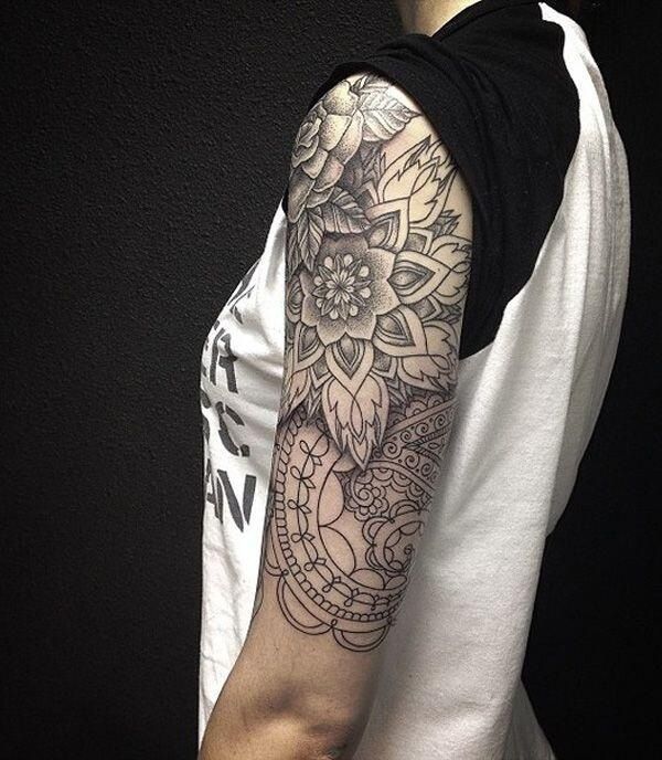 Black And Grey Abstract Flowers Tattoo On Left Half Sleeve