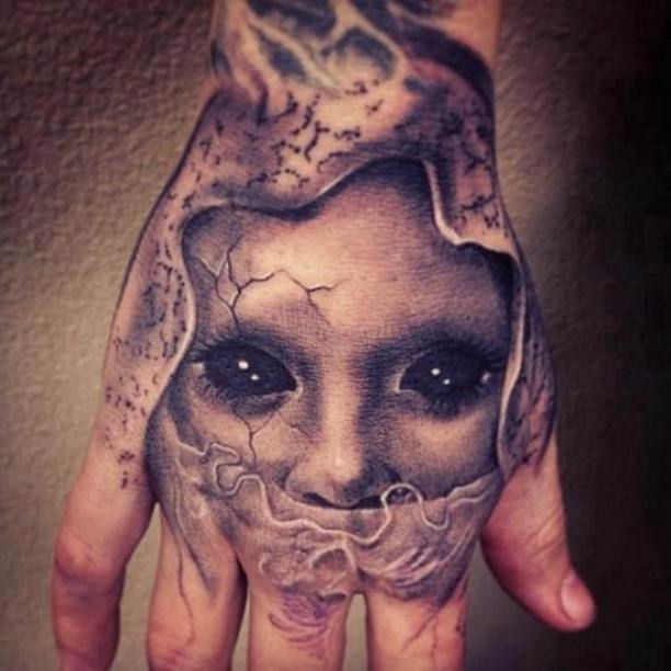 Black And Grey Horror Face Tattoo On Hand