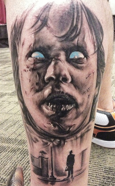 Black And Grey Horror Girl Face Tattoo On Left Leg