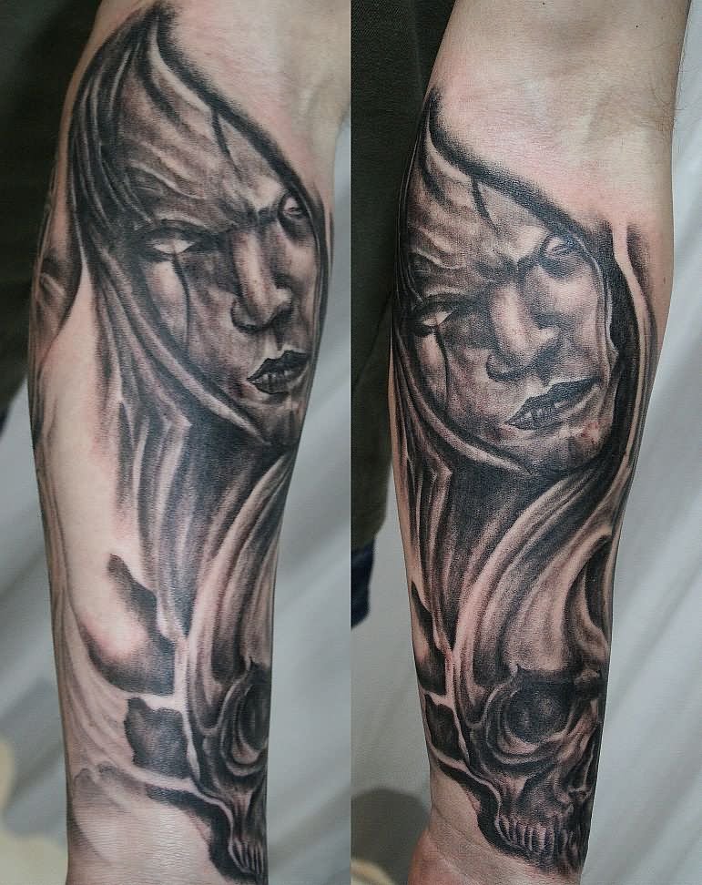 Black And Grey Horror Girl Face With Skull Tattoo Design For Arm