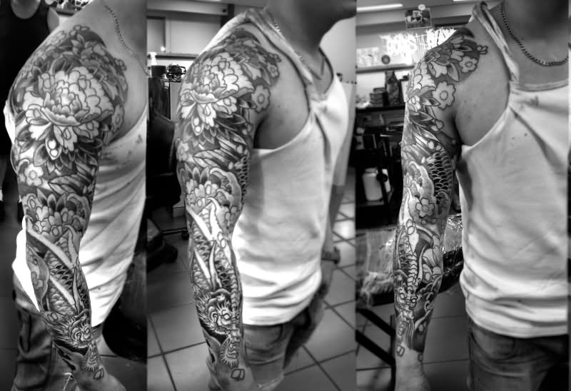 Black And Grey Japanese Dragon With Flowers Tattoo On Right Full Sleeve
