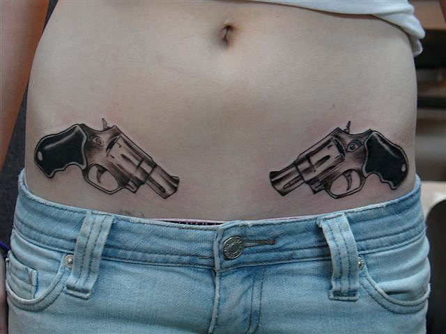 Black And Grey Revolver Tattoos On Hip