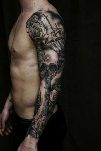 Black And Grey Ship With Rose And Skull Tattoo On Man Left Full Sleeve