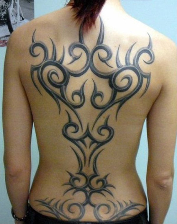 Black And Grey Tribal Design Tattoo On Full Back