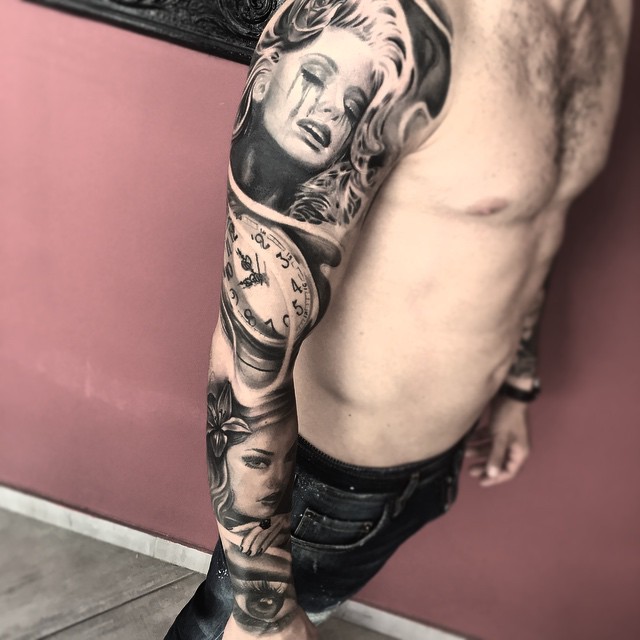 Black And Grey Two Girl Face With Clock Tattoo On Right Full Sleeve