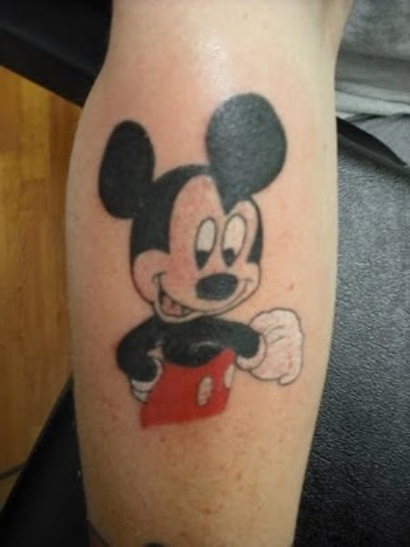 Black And Red Mickey Mouse Tattoo On Leg