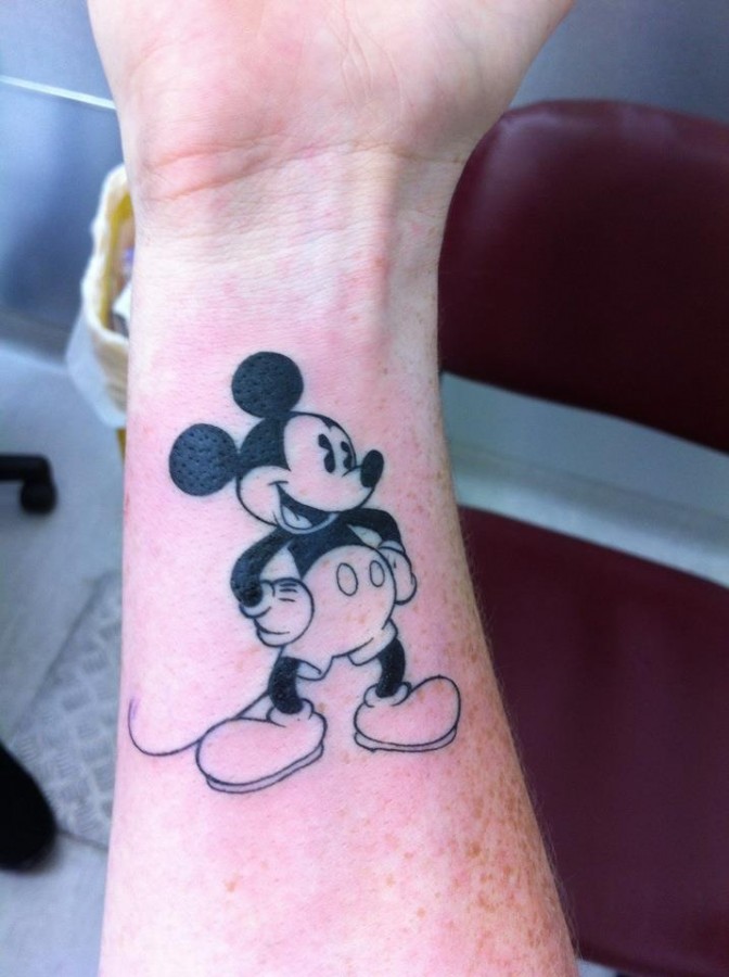 Black And White Mickey Mouse Tattoo On Right Forearm