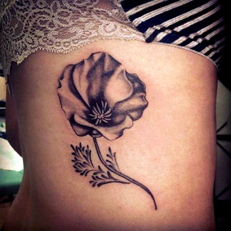 Black And White Poppy Flower Tattoo On Girl Side Rib