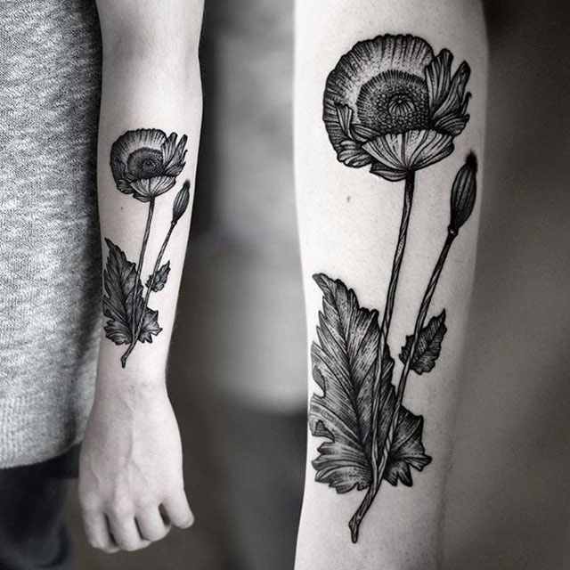 Black And White Poppy Flower Tattoo On Left Arm