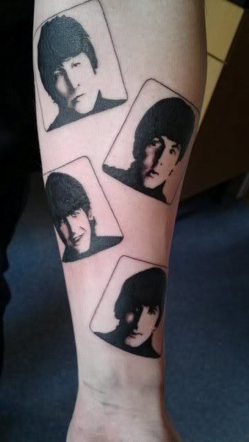 Black Beatles Face Tattoo Design For Forearm