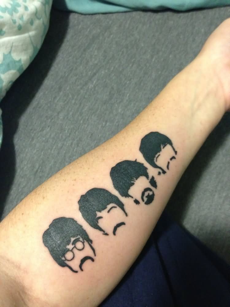 Black Beatles Faces Tattoo On Left Forearm