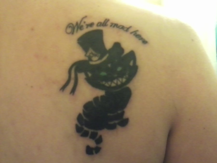Black Ink Cheshire Cat Tattoo On Right Back Shoulder