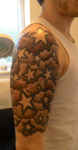 Black Ink Cloud Shading With Stars Tattoo On Man Right Half Sleeve