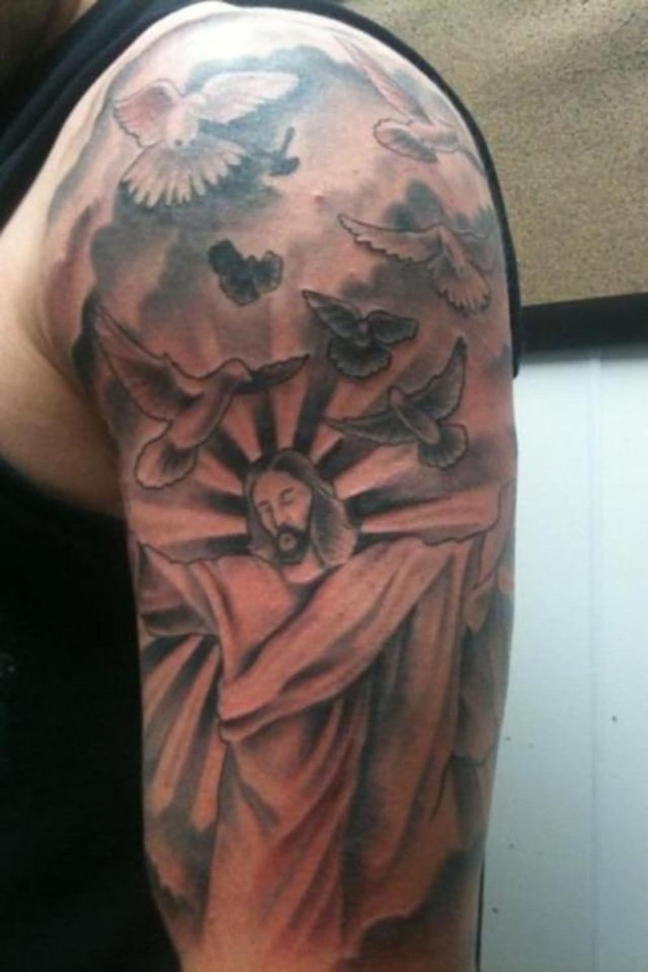 Black Ink Flying Birds With Jesus And Clouds Tattoo On Left Half Sleeve