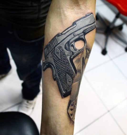 Black Ink Revolver Tattoo On Left Forearm