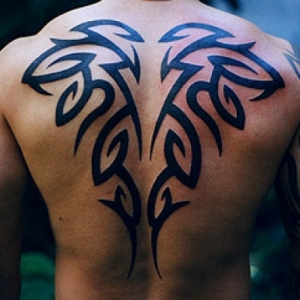 Black Tribal Design Tattoo On Full Back